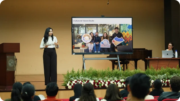 Gaby giving a talk at a university in Ecuador